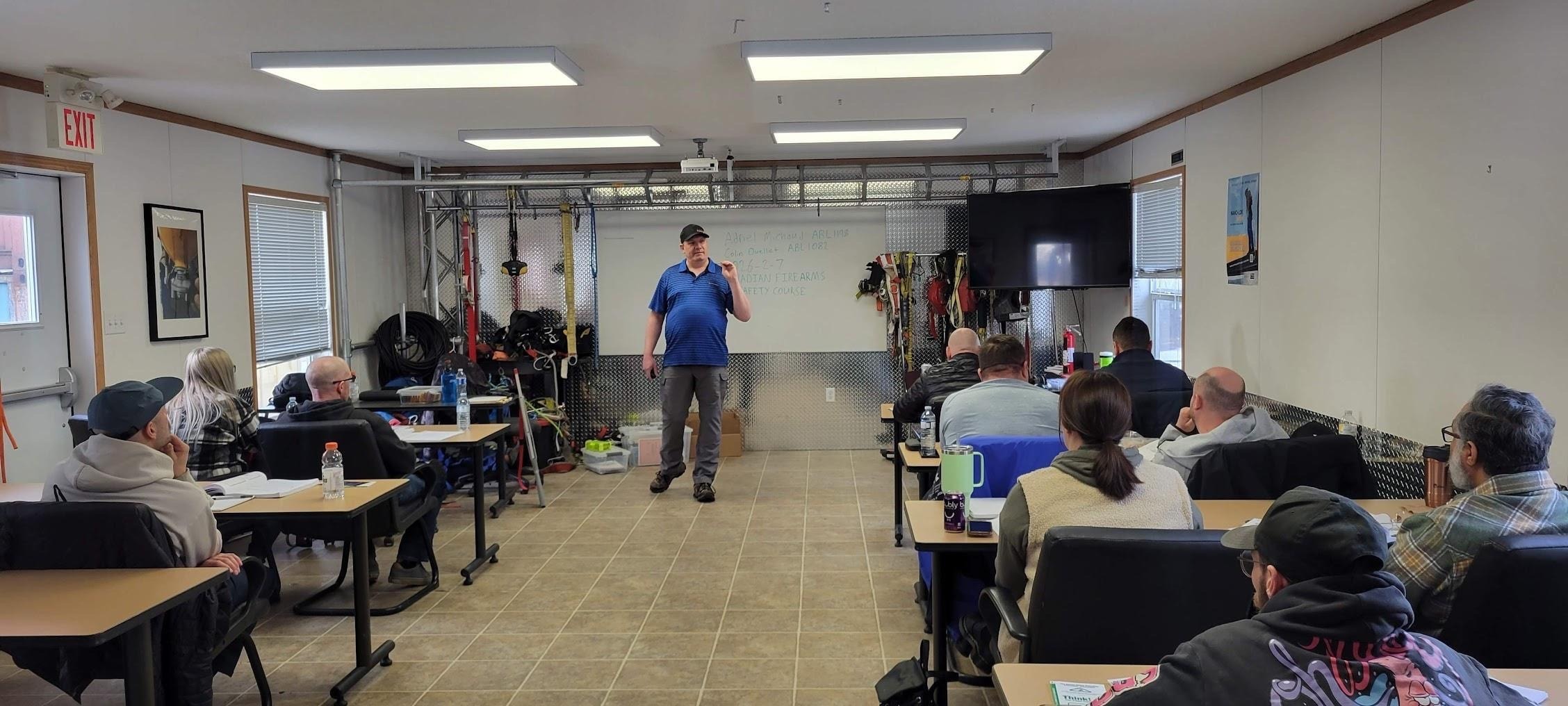 Colin teaching a CFSC class with students at desks